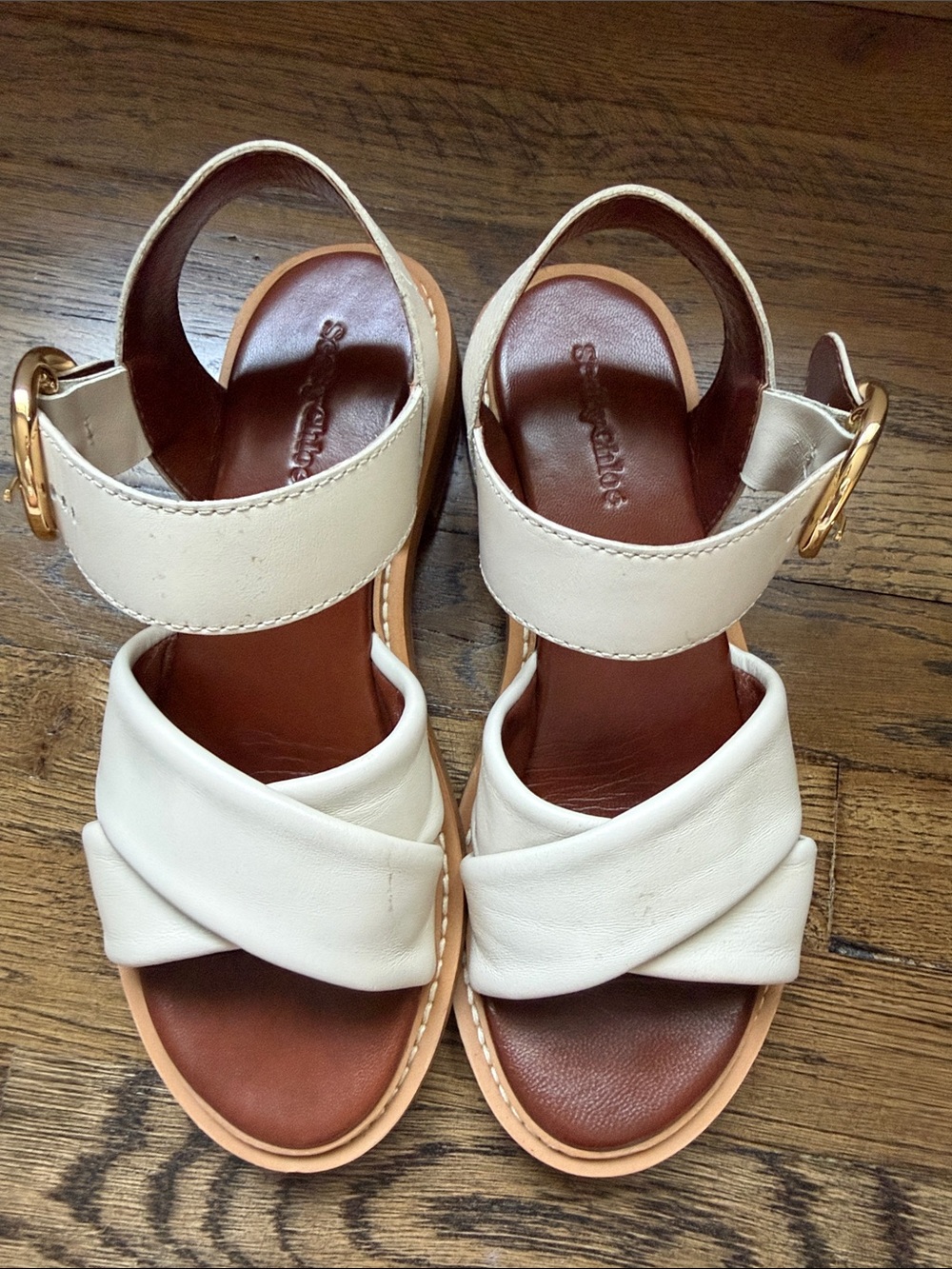 See By Chloe Cream Leather Crisscross Sandals with Gold Buckle